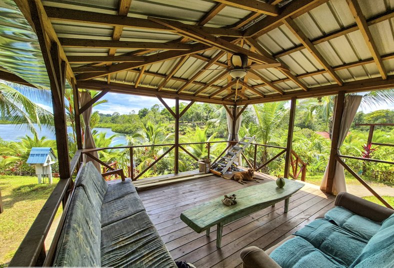 Outdoor covered deck overlooking the water